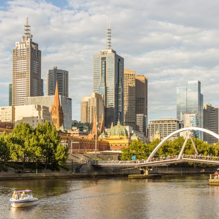 Tourist,People,Speedboat,Ferry,Cruise,Yarra,River,With,Melbourne,Skyline
